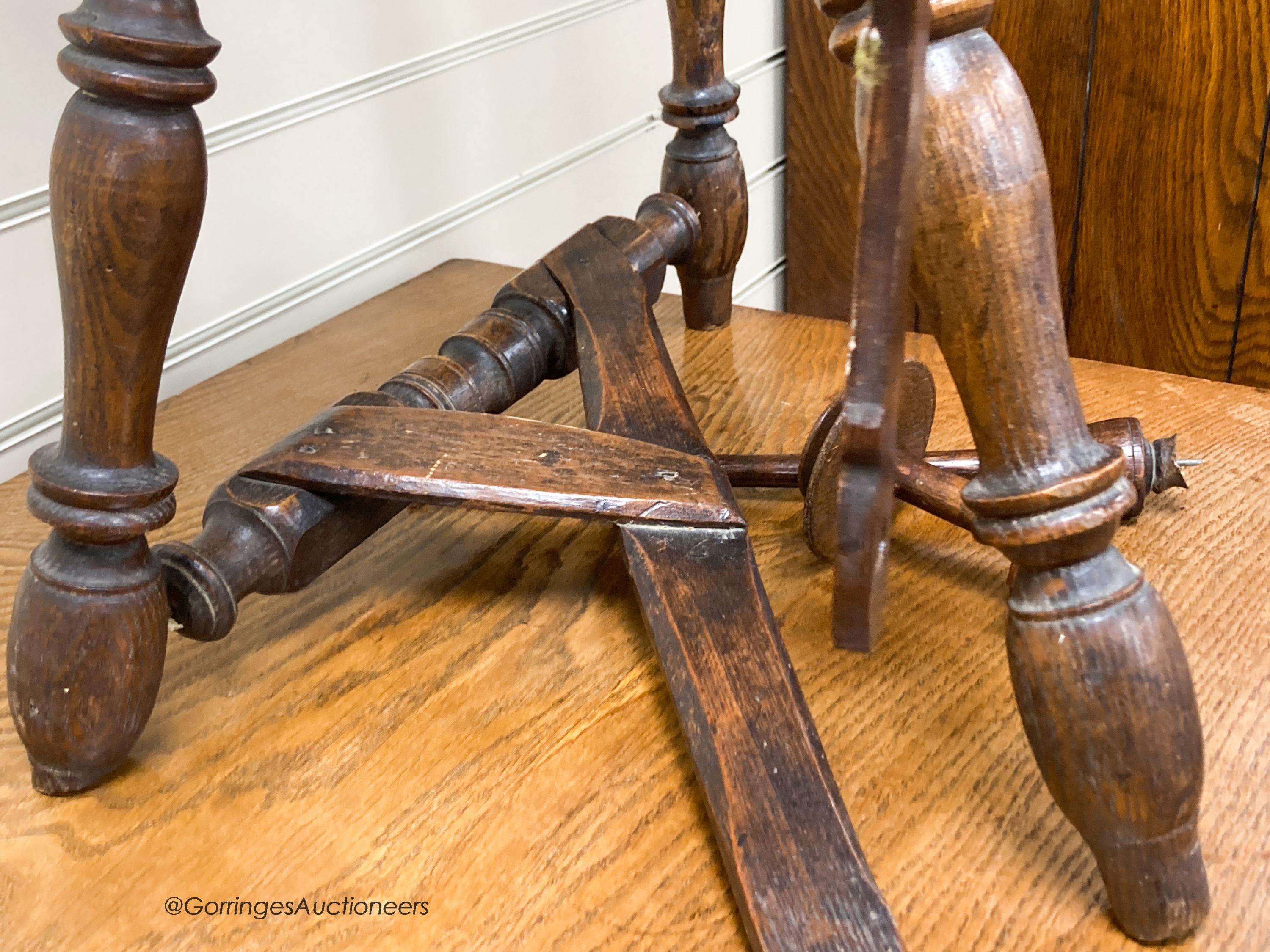 A 19th century beech and elm spinning wheel, height 92cm